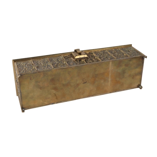 1648 - A brass candle box in the Gothic Revival taste, 30cms wide.