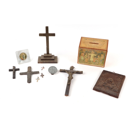 1652 - A collection of religious related items to include a Corpus Christi, a brass crucifix, other crucifi... 