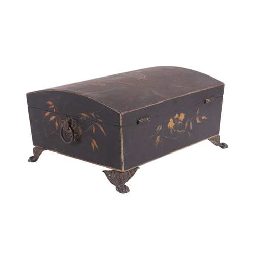 1695 - A 19th century dome topped casket with chinoiserie decoration and pressed brass lion paw feet, 27cms... 