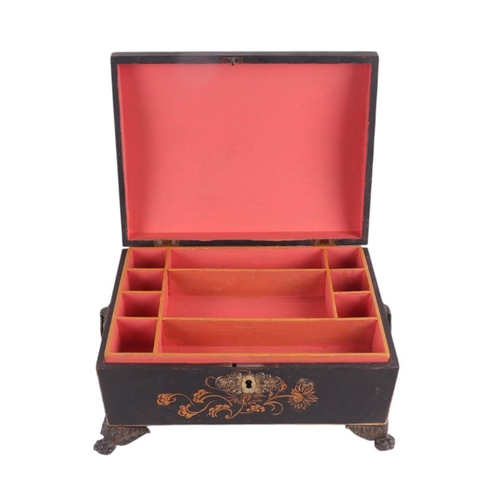 1695 - A 19th century dome topped casket with chinoiserie decoration and pressed brass lion paw feet, 27cms... 