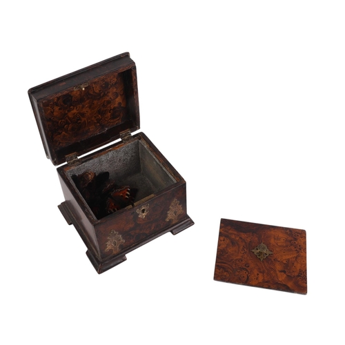 1708 - An early 19th century papier-mâché faux burr walnut painted tea caddy with internal lid and brass mo... 