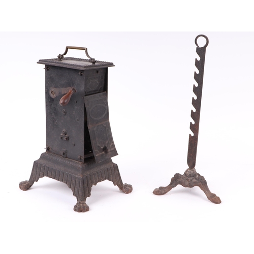 1712 - A 19th century cast iron clockwork roasting jack, 35cms high.