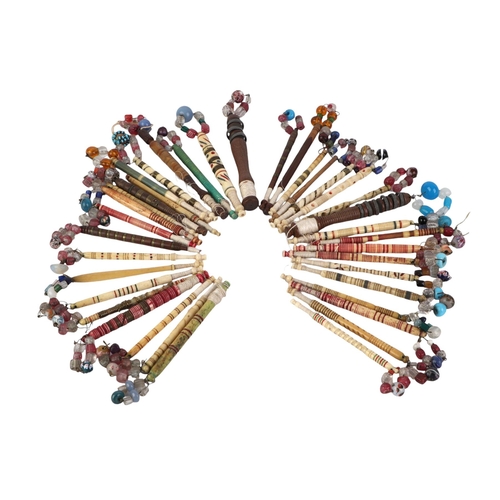Thirty eight antique bone and wooden lace bobbins with ornate turned ...