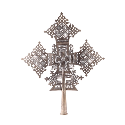 1822 - An Ethiopian Coptic silver plated processional cross, 77cms high.