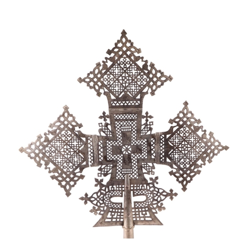 1822 - An Ethiopian Coptic silver plated processional cross, 77cms high.