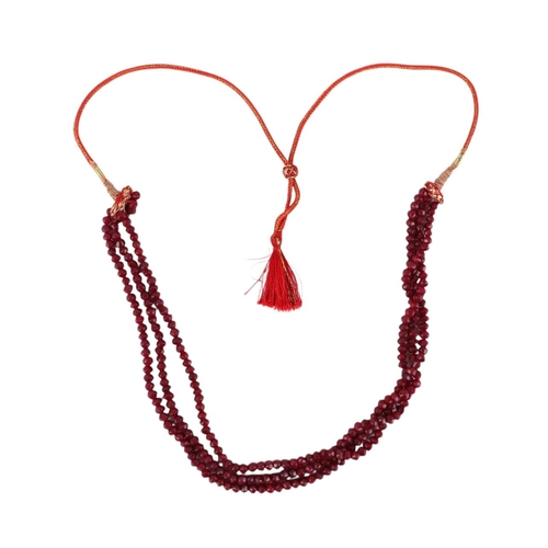 1937 - An Indian three-strand rough faceted cut ruby bead necklace.