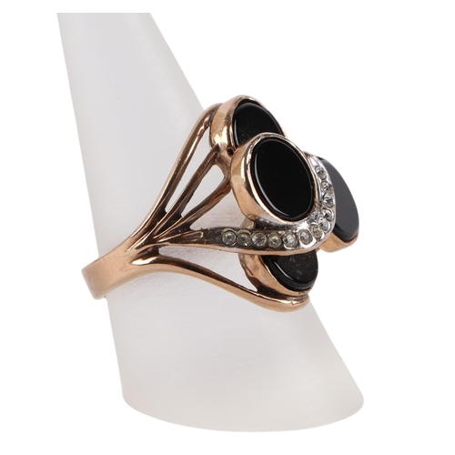 1939 - A 14k rose gold plated onyx and white stone set cocktail ring, approx UK size R, 8.4g.