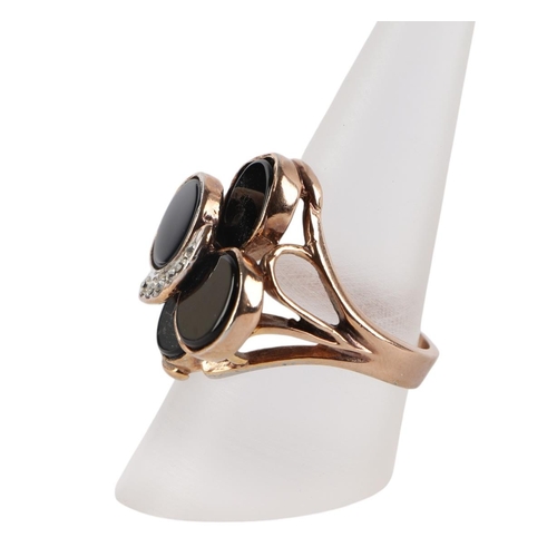 1939 - A 14k rose gold plated onyx and white stone set cocktail ring, approx UK size R, 8.4g.