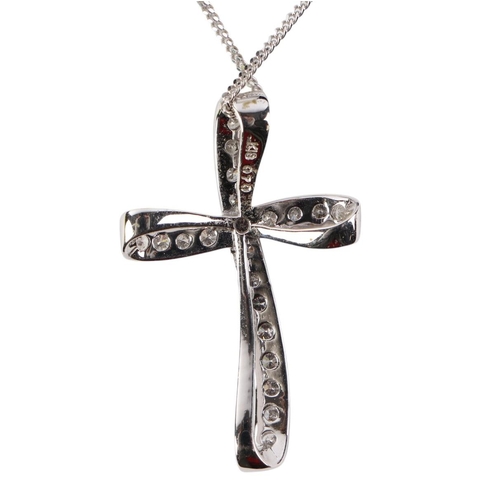 1942 - An 18ct white gold diamond set cross pendant on a fine 18ct white gold chain, 6.7g.