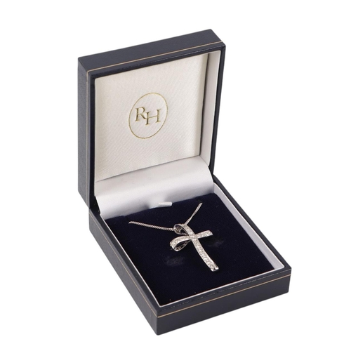 1942 - An 18ct white gold diamond set cross pendant on a fine 18ct white gold chain, 6.7g.