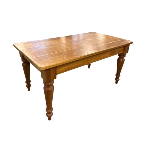 2482 - A bespoke solid cherry wood kitchen table, the rectangular top on baluster turned legs, 152cms long.