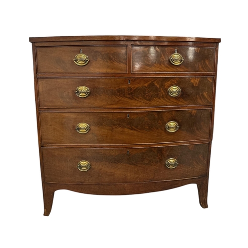 2484 - An early 19th century figured mahogany bowfront chest of two short and three graduated long drawers,... 