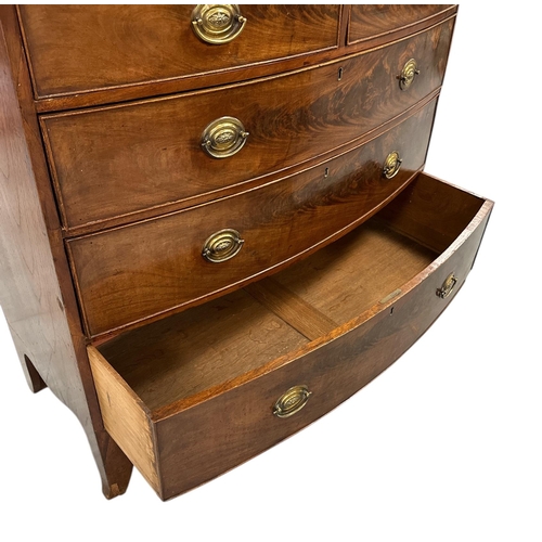 2484 - An early 19th century figured mahogany bowfront chest of two short and three graduated long drawers,... 