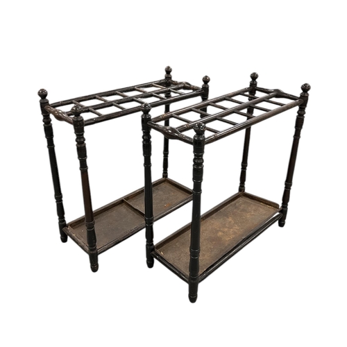 2522 - A pair of late 19th century twelve-division stick stands, 61cms wide.