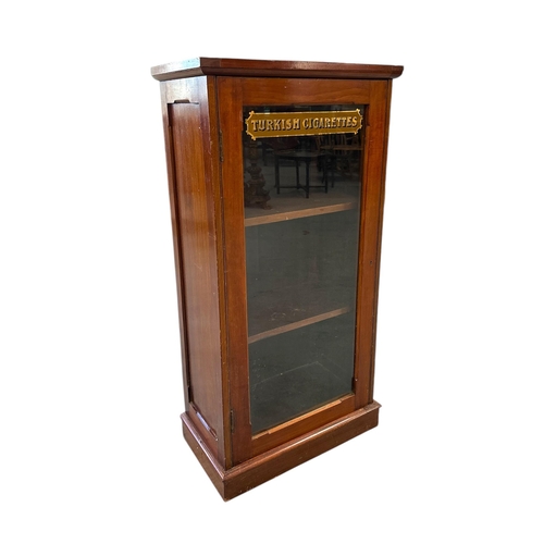 2523 - A mahogany shop display cabinet, the glazed door with gilt lettering 'Turkish Cigarettes', 59cms wid... 