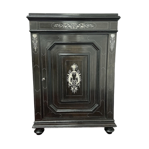 2528 - A 19th century Italian ebony and inlaid ivory Pier cabinet with single door and central panel inlaid... 