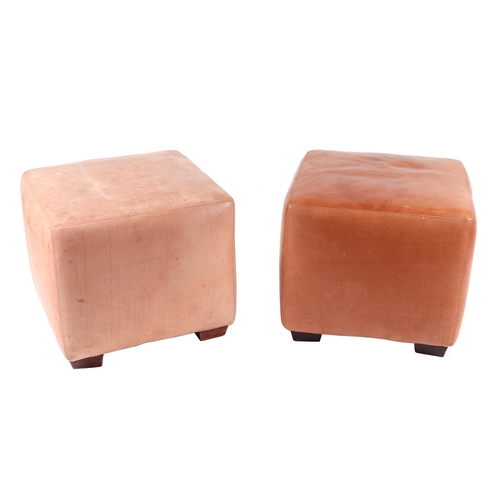 2529 - A pair of square form leather footstools, 54cms wide (2).