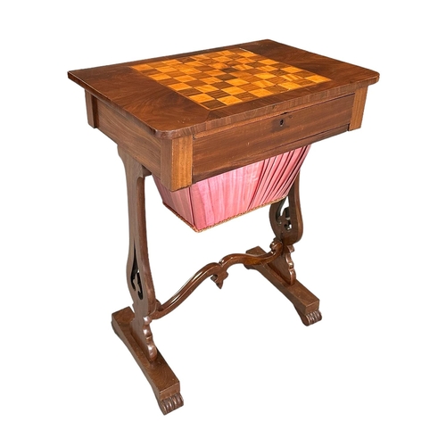 2531 - A 19th century work table with inlaid chess board top above a frieze drawer and silk lined well, on ... 