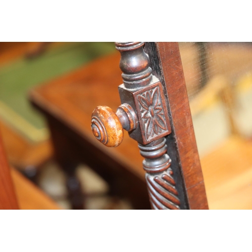 2534 - A 19th century toilet mirror with three short drawers, on bun feet, 56cms wide.