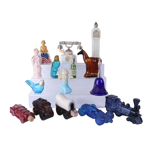 27 - A large quantity of vintage glass perfume bottles, some with original contents.