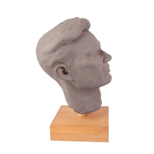 277 - William Dench (circa 1960) - a plaster head study of a man, mounted on a pine plinth, 26cms high.