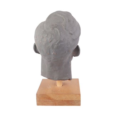 277 - William Dench (circa 1960) - a plaster head study of a man, mounted on a pine plinth, 26cms high.