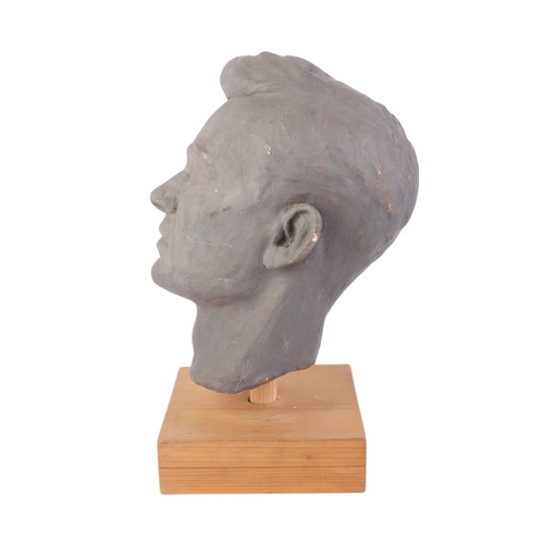 277 - William Dench (circa 1960) - a plaster head study of a man, mounted on a pine plinth, 26cms high.