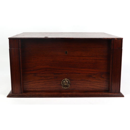 281 - An oak canteen / collector's cabinet with double Wellington chest style locking mechanism, 42cms wid... 