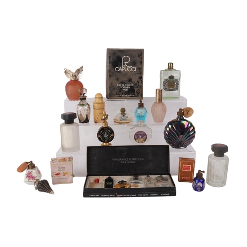 29 - A large quantity of vintage glass scent bottles including miniature examples.