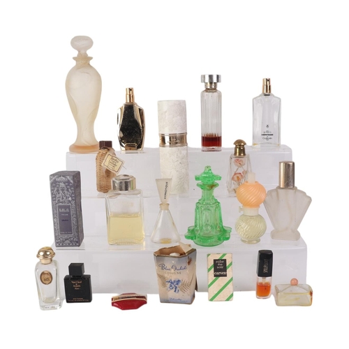 29 - A large quantity of vintage glass scent bottles including miniature examples.