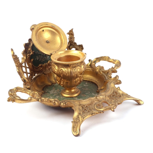 293 - A French gilt brass desk stand, 19cms wide.