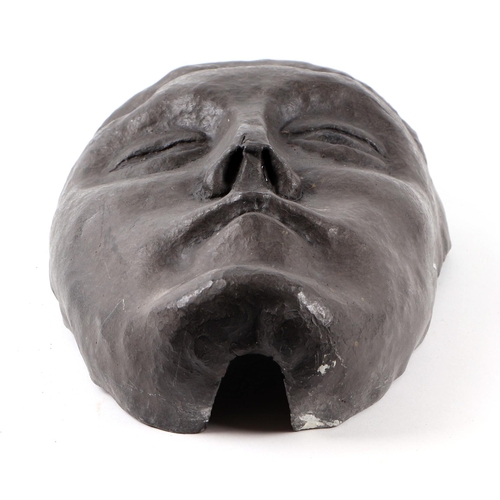 294 - A lead mask wall plaque, 18cms by 27cms.