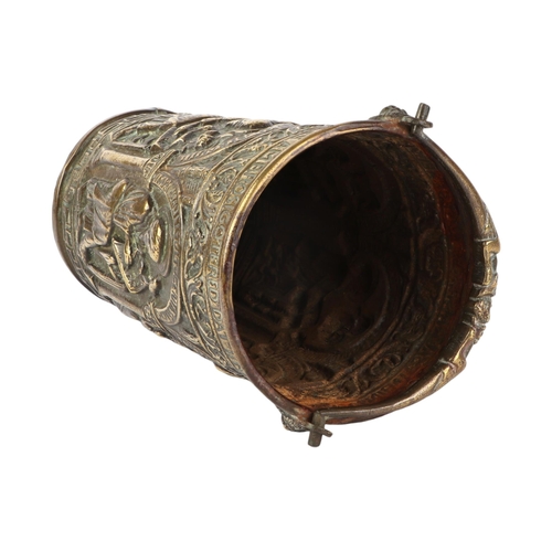 298 - An ornate repoussé brass holy water bucket / pail situla depicting saints, 19cms high.