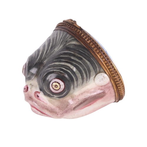 305 - An 18th century South Staffordshire enamel bonbonniere in the rare form of a fish head and decorated... 