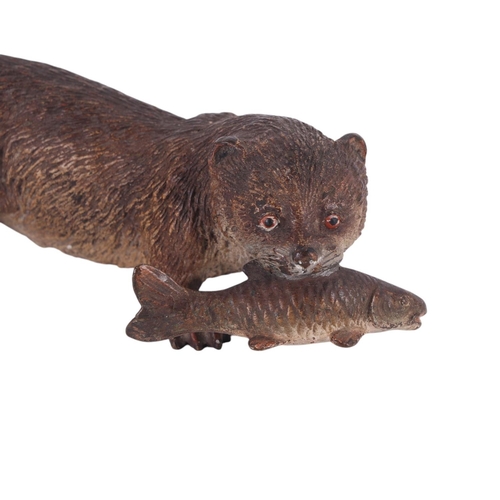 306 - A large Vienna cold painted bronze figure of an otter with a fish in its mouth, 17.5cms long.