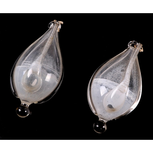 34 - A pair of early 19th century Dutch weather glasses or Donderglas, pear shaped with integral suspensi... 