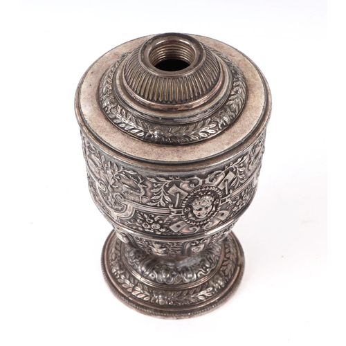 407 - A Victorian silver plated lamp base decorated in relief with masks, animals and flowers, 14cms high.