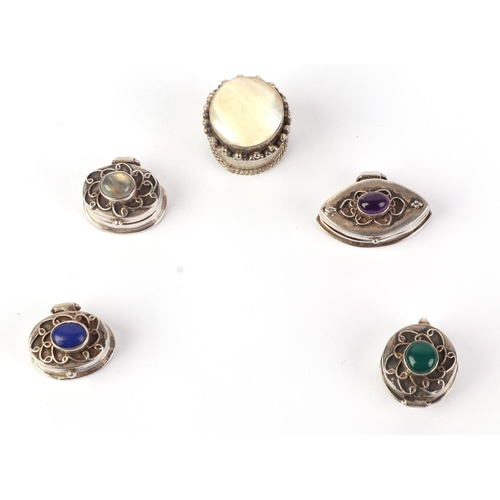 418 - Four cabochon gem set 925 silver pill boxes, the largest 2.5cms wide; together with a similar white ... 