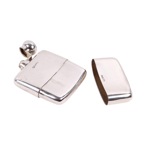 421 - An Art Deco silver hip flask and cup, Chester 1932, 12.5cms high, 190g.