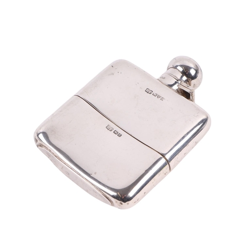 421 - An Art Deco silver hip flask and cup, Chester 1932, 12.5cms high, 190g.