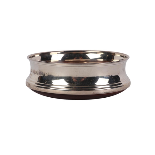 428 - A Carrs silver and mahogany wine bottle coaster, 10cms diameter, boxed.