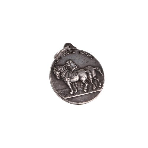 439 - A Shire Horse Society silver prize medal by Mappin & Webb, 4.5cms diameter, 49g.