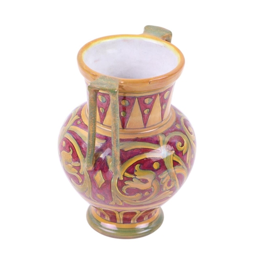 45 - An Italian maiolica two-handled vase with Arabesque design, 16cms high.