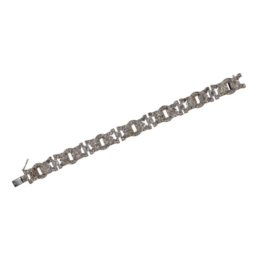 479 - An Art Deco French 935 silver mounted paste bracelet, 19cms long; together with a blue stone and pas... 