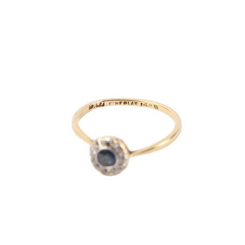 486 - An 18ct gold and platinum diamond and sapphire cluster ring, approx UK size P,  2g.