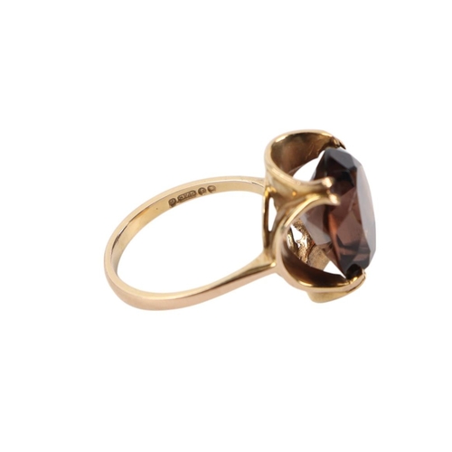 506 - A 9ct gold and smoky quartz solitaire ring, approx UK size N, approx 4.9g.