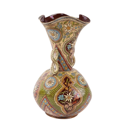 51 - A Swiss Thun majolica twin-handled vase with pinched rim, signed, 33cms high (a/f).