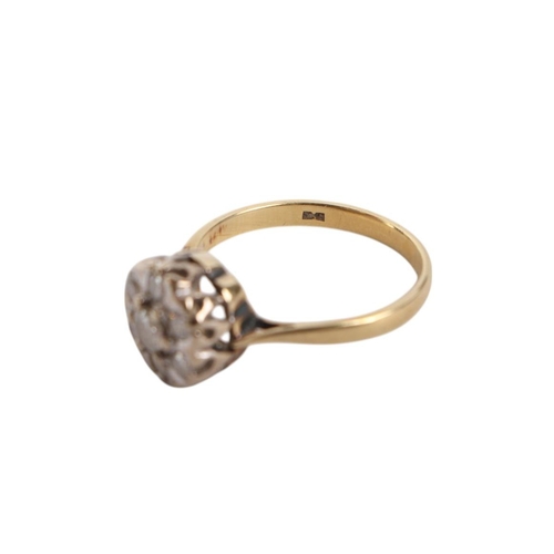 531 - An 18ct gold diamond flowerhead ring, approx UK size O, 3.9g.