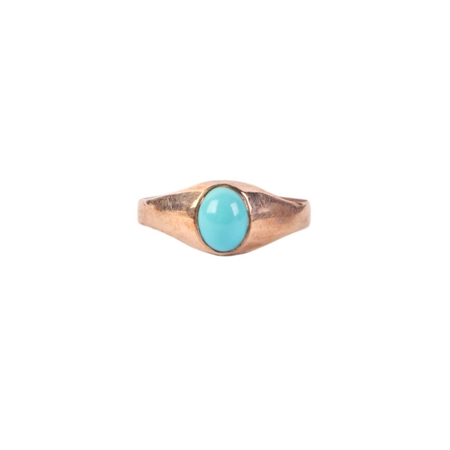 532 - A yellow metal ring (tests as 9ct) set with an oval turquoise cabochon, approx UK size L, 1g.