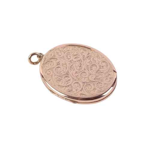 537 - An Edwardian 9ct gold locket with chased floral decoration, 6.9g.